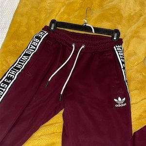 ADIDAS TRACK PANTS IN MAROON
